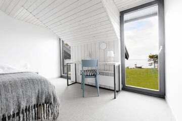 Фото номера Коттедж с 6 спальнями Дома для отпуска Kalaranna Holiday Home г. Eisma 43