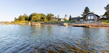Фото номера Коттедж с 6 спальнями Дома для отпуска Kalaranna Holiday Home г. Eisma 57