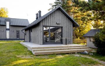 Фото номера Коттедж с 6 спальнями Дома для отпуска Kalaranna Holiday Home г. Eisma 19