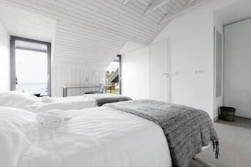 Фото номера Коттедж с 6 спальнями Дома для отпуска Kalaranna Holiday Home г. Eisma 28