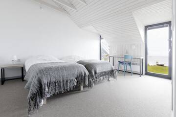 Фото номера Коттедж с 6 спальнями Дома для отпуска Kalaranna Holiday Home г. Eisma 27