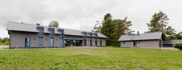 Фото номера Коттедж с 6 спальнями Дома для отпуска Kalaranna Holiday Home г. Eisma 9