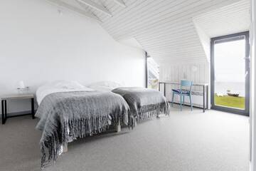 Фото номера Коттедж с 6 спальнями Дома для отпуска Kalaranna Holiday Home г. Eisma 40